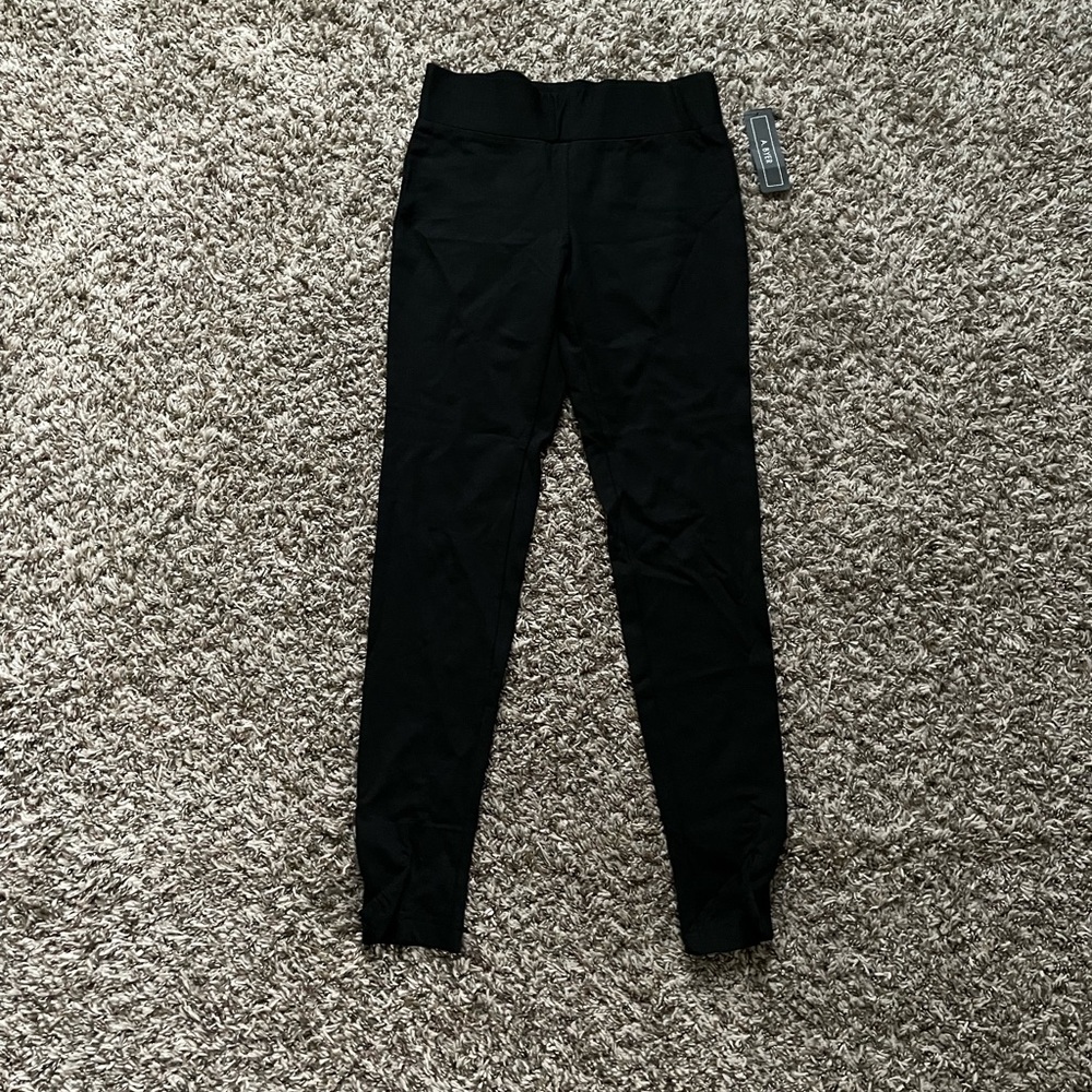 Black straight leg dressy pants with front opening ( NWT)